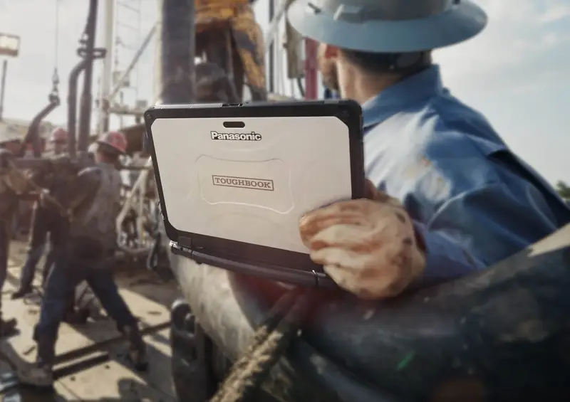 A Panasonic Toughbook tablet in use on an oil rig
